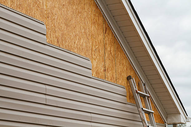 Professional Emergency Siding Repair technician working in Bruington, VA